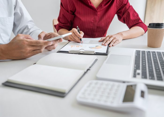 Business casual team meeting working with new startup project, d Business casual team meeting working with new startup project, discussion and analysis data the charts and graphs, computer using, Business finances and strategy accounting concept.